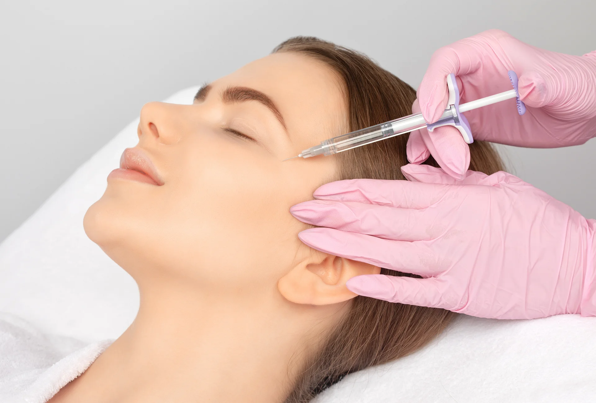 A Woman Getting Cheek Filler||