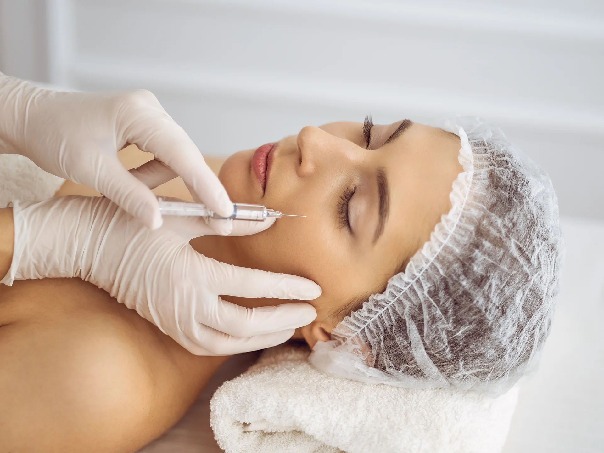 A Woman Getting Cheek Filler Injection||