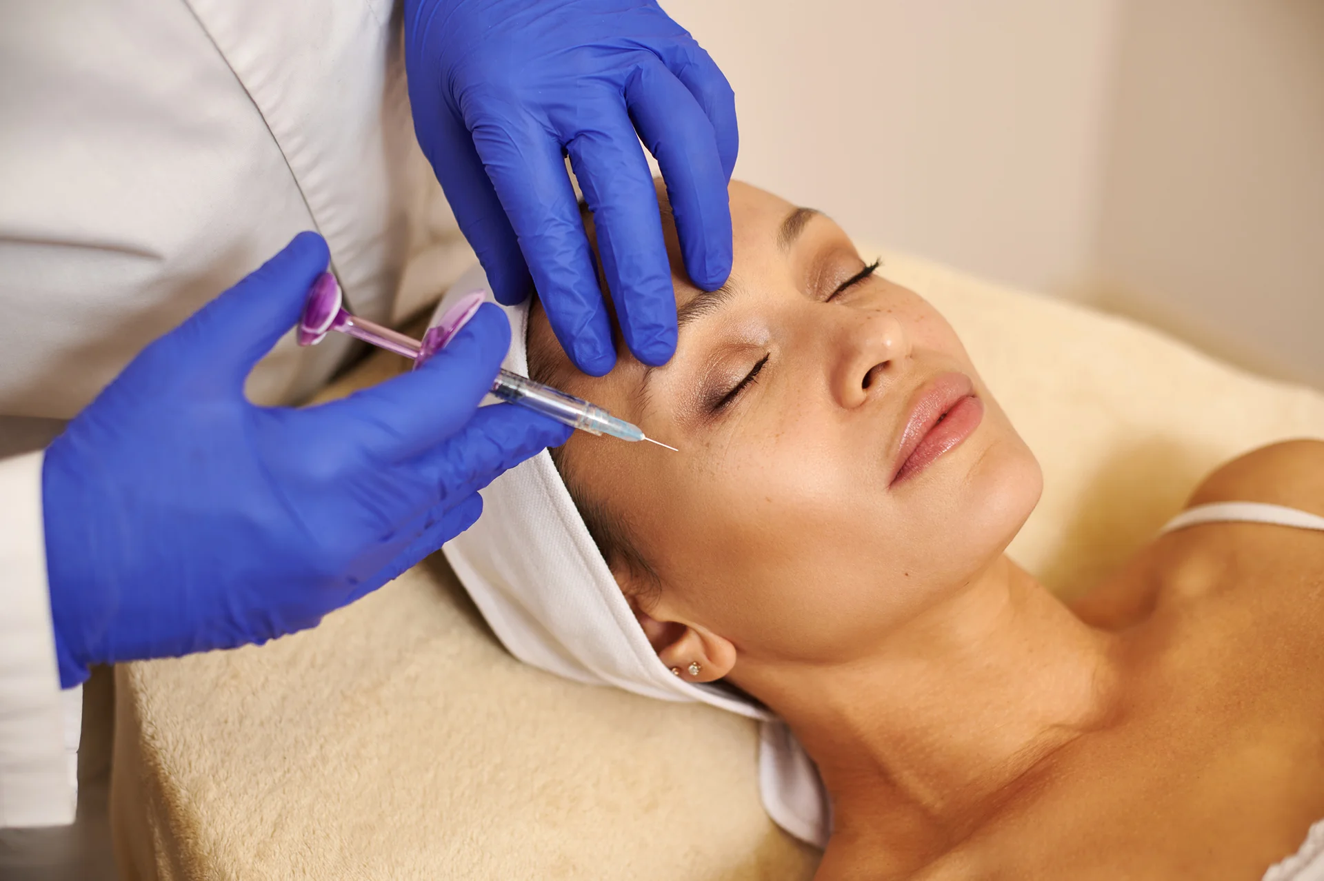 A Woman Getting Cheek Filler Injection||
