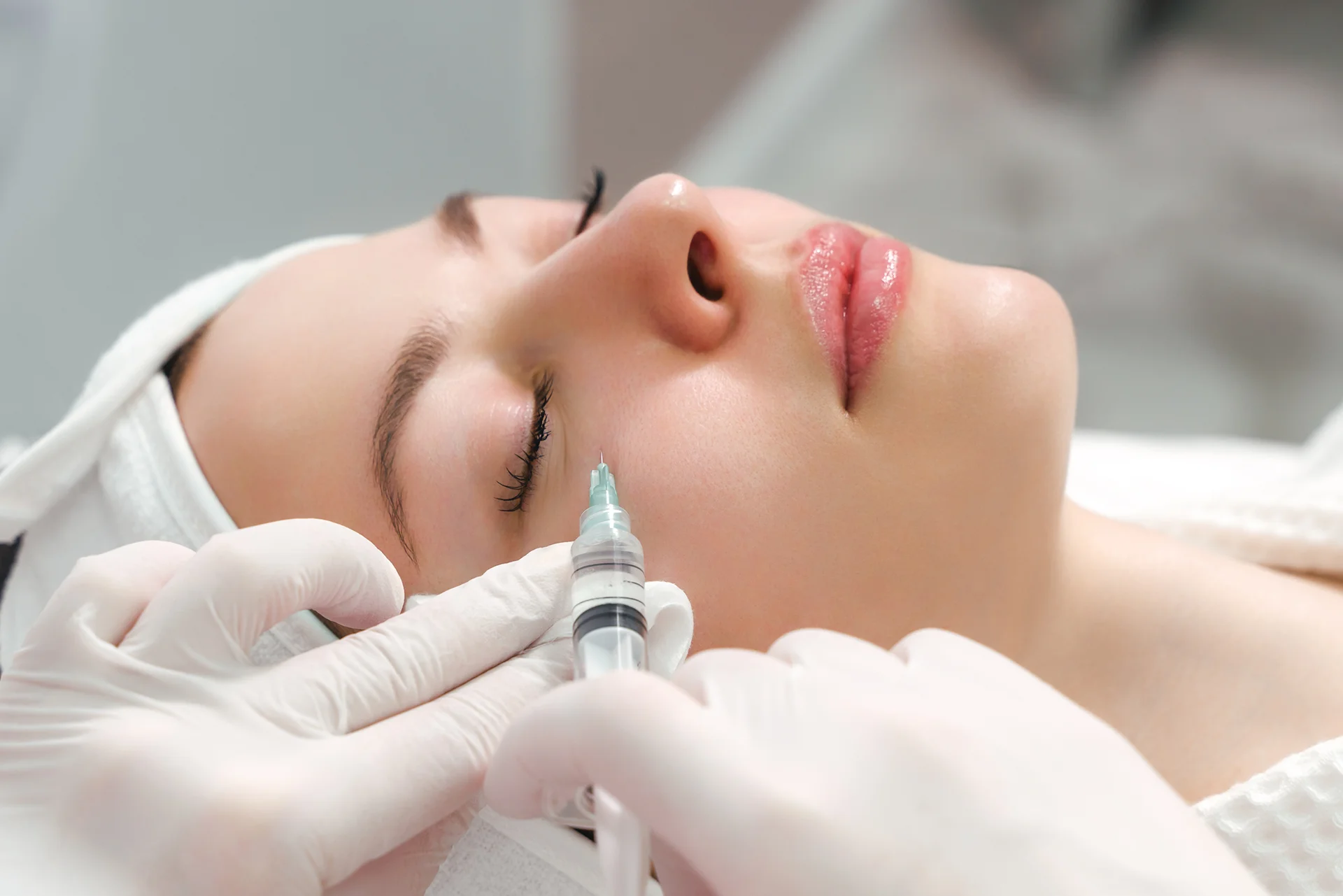 A Woman Getting Cheek Filler Treatment|