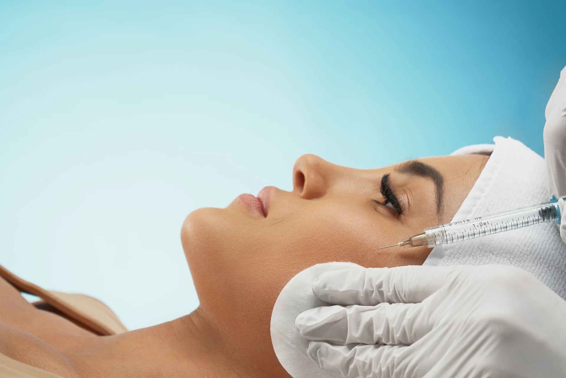 A Woman Getting Cheek Filler||