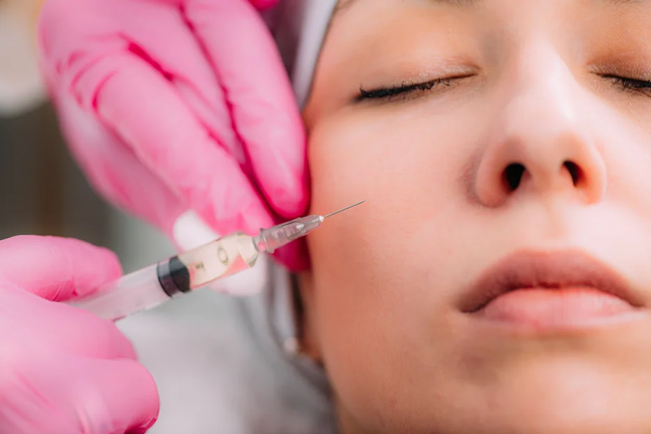 A woman getting cheek fillers