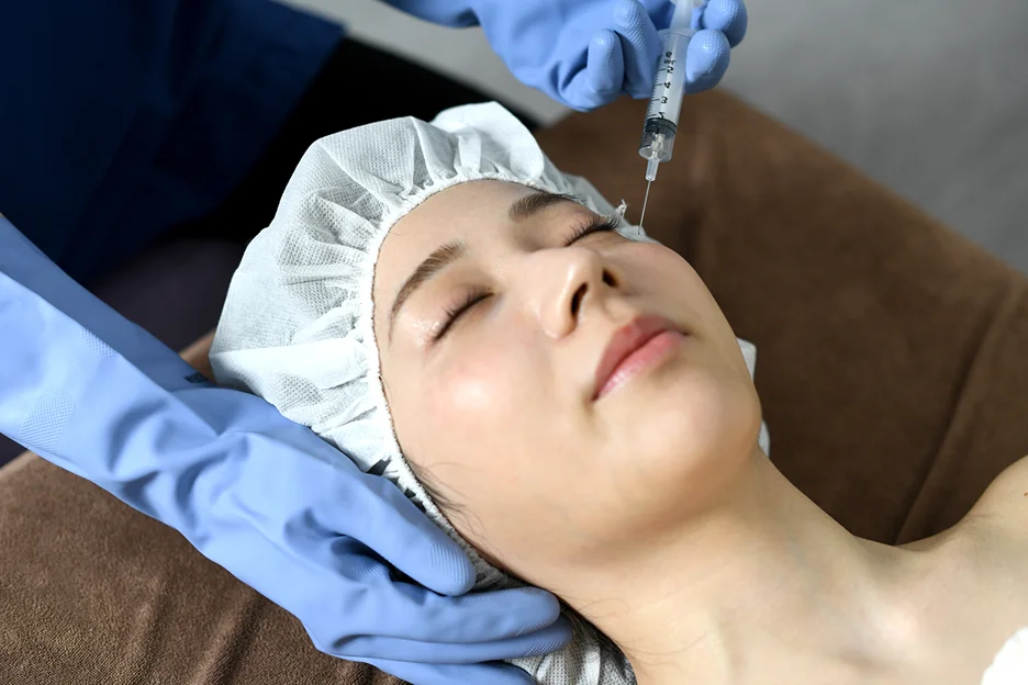 A Woman Getting Cheek Filler Treatment