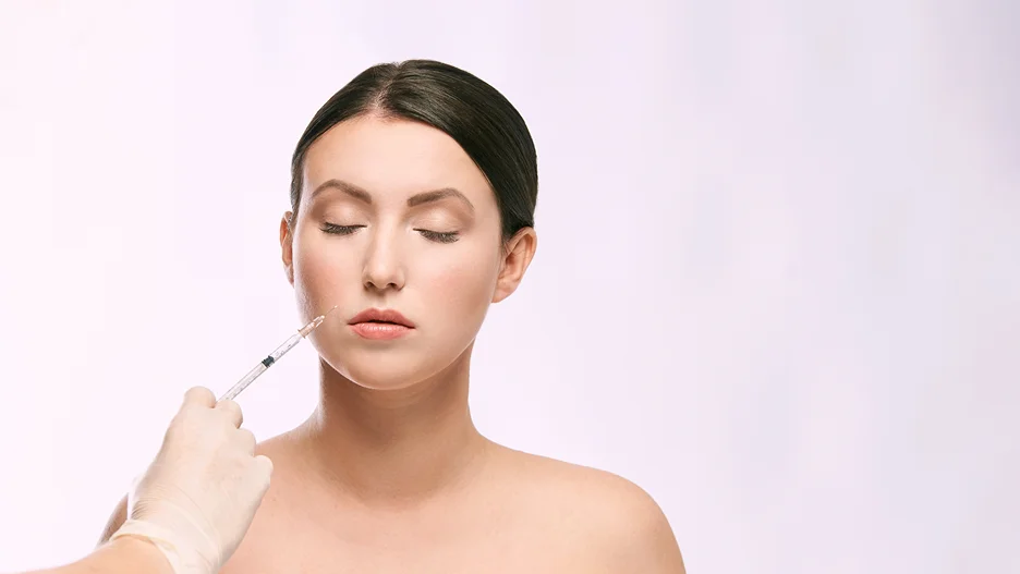 A Woman Getting Cheek Filler injection